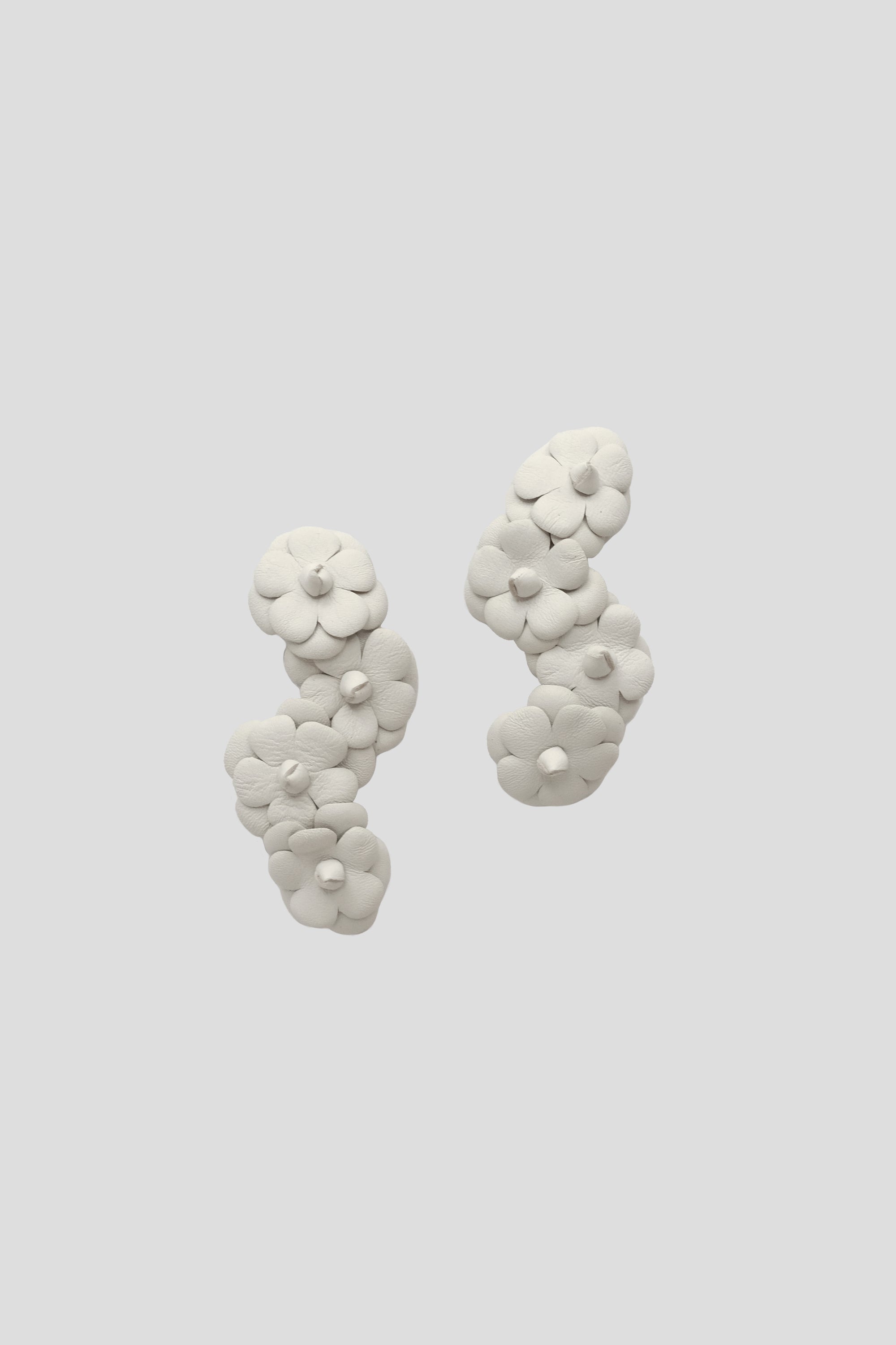 Four Camellia Clip On Shoes Accessories in White